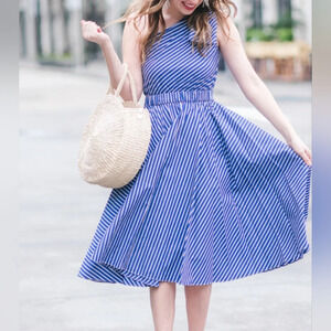 Blue striped one shoulder dress with a bow. Girly, fun. Size Med. Brand cupio